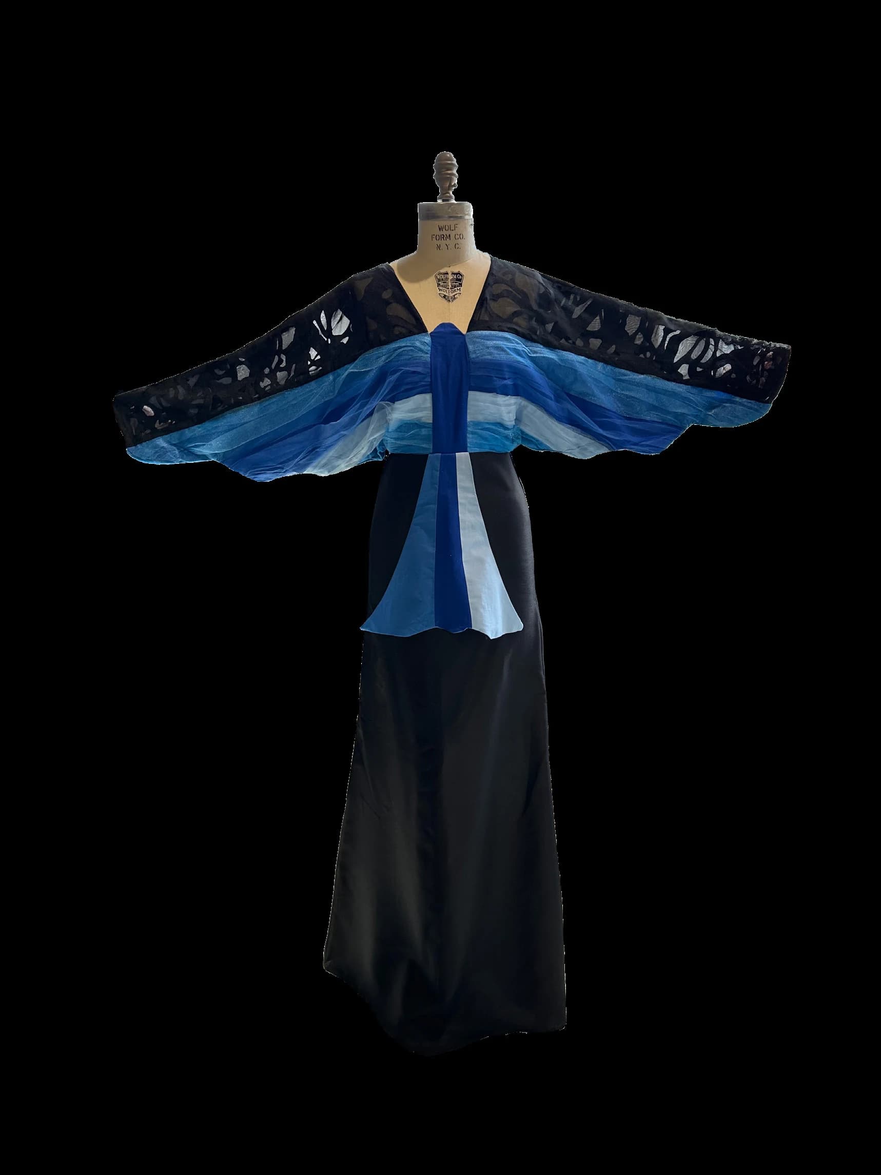 Finished blue and black Fantasy Dress displayed on a dress form.