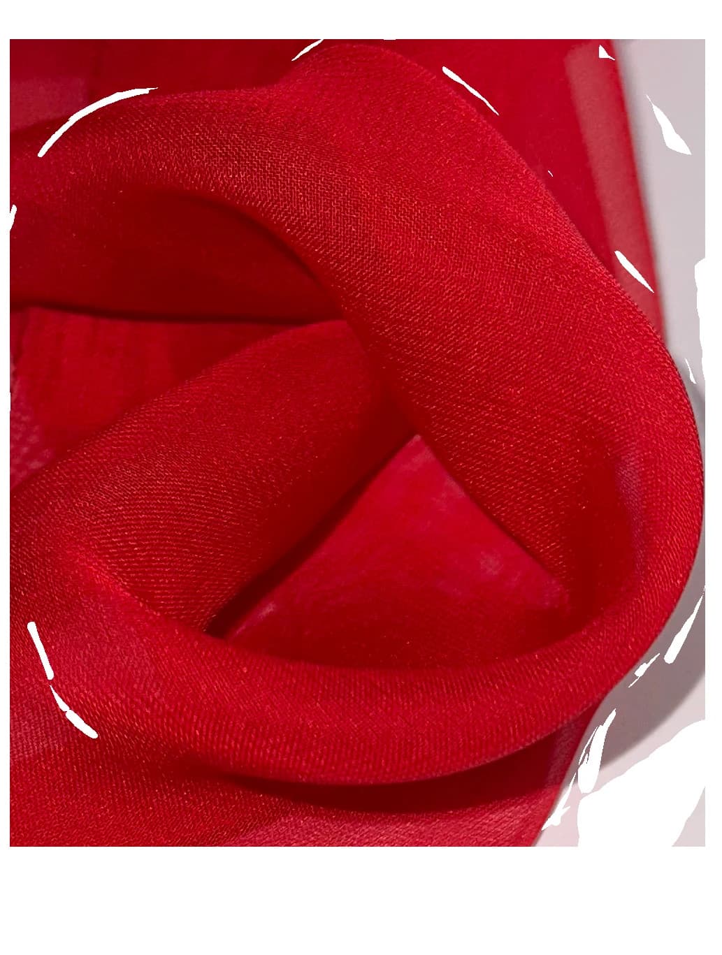 Rolled red textile selected for the Passion project.