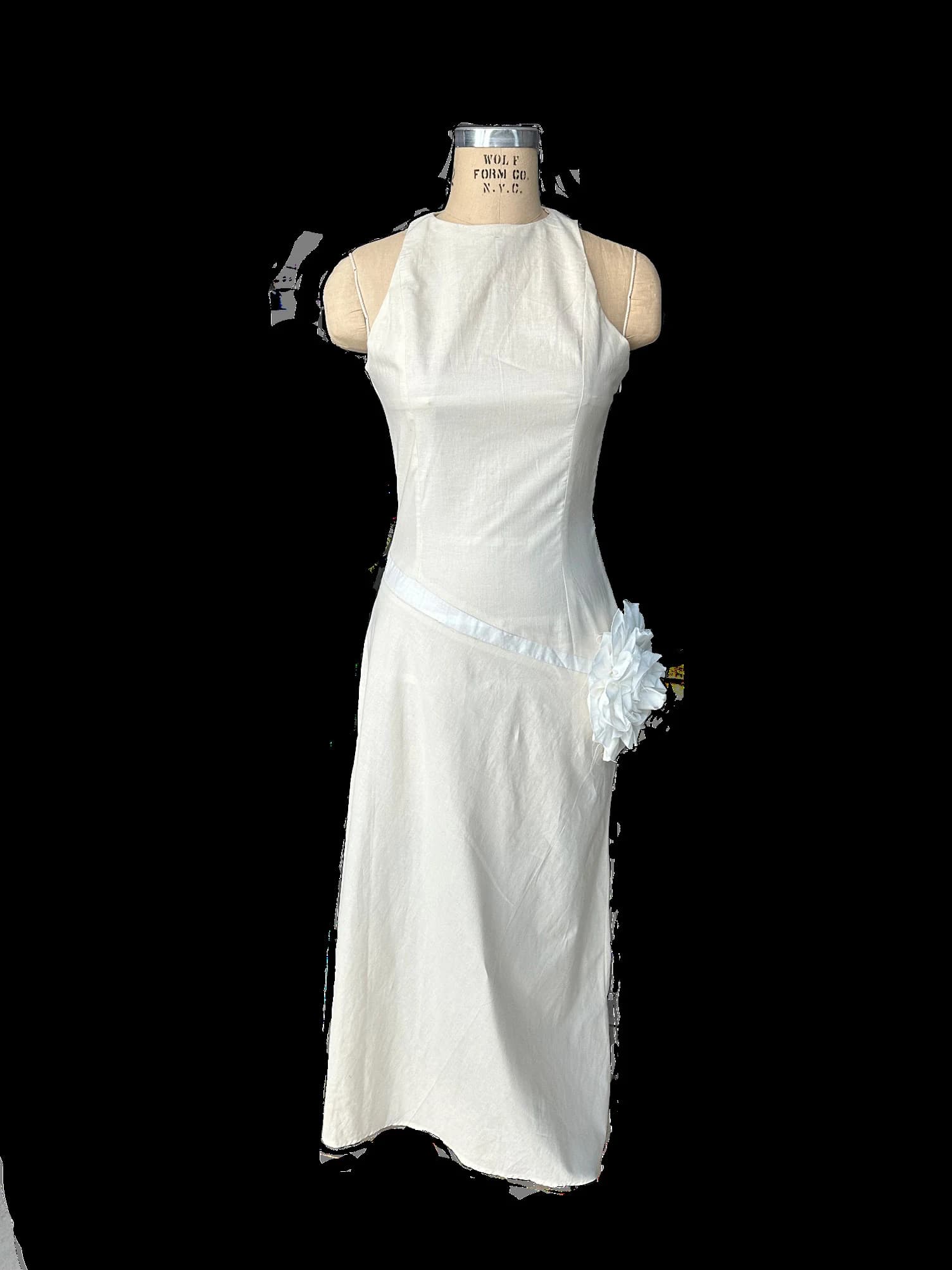 White Passion dress toile on a dress form, side view.